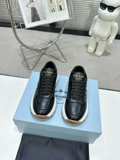 2025 Unisex Prada Black Calf Leather Sneakers KFY00310
